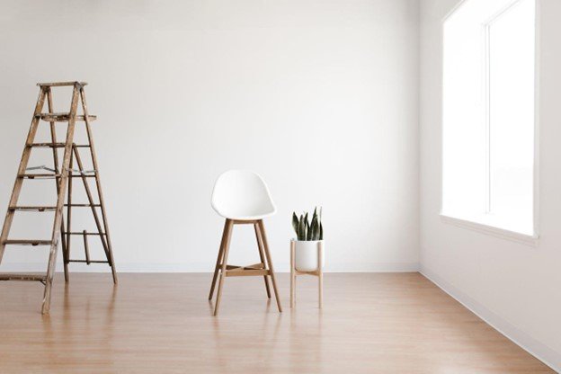 White round chair near white wall