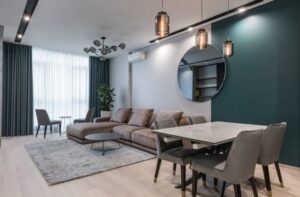 A photo of a contemporary living room with nice flooring, sofa and carpet