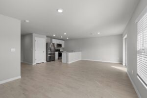 An almost empty white kitchen