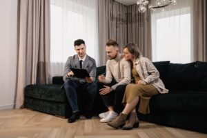 Real estate agent talking to a couple