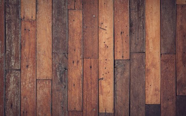 Dark brown floorboards.