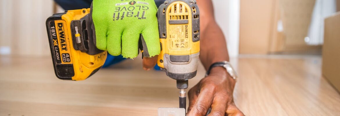 A person using cordless impact driver